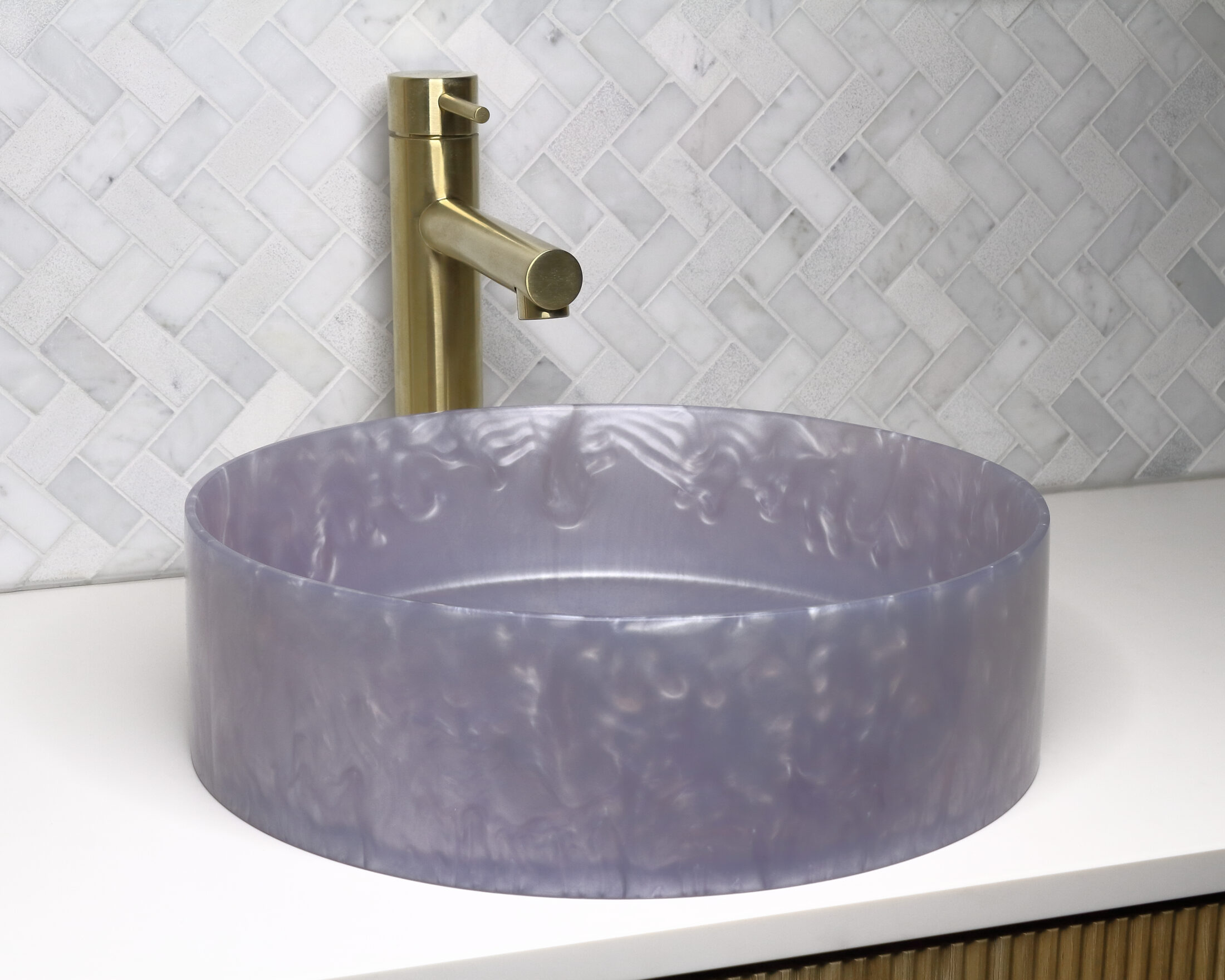 The Basin Lab's lavender coloured resin basin from their akoya series