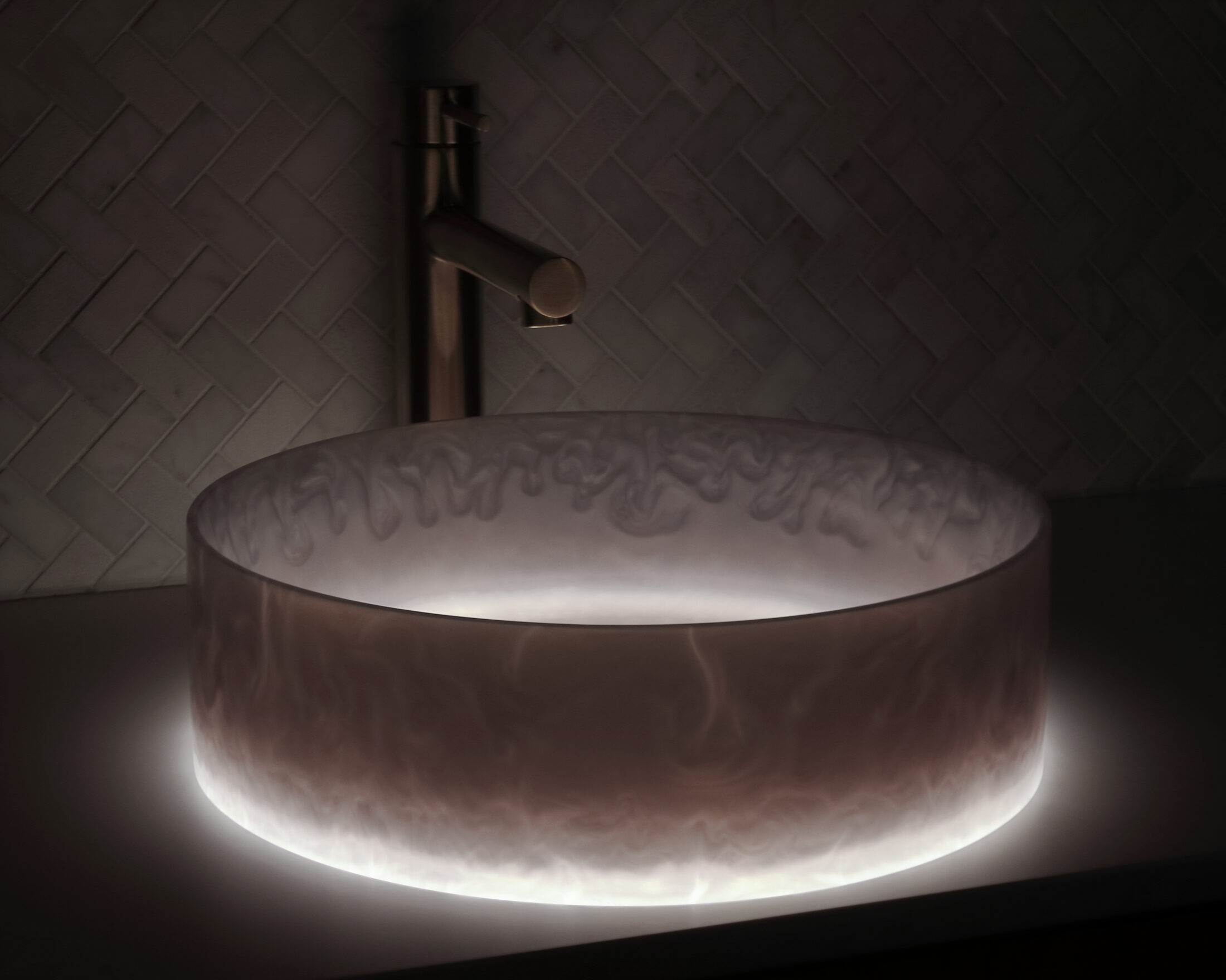 The Basin Lab's lavender coloured resin basin from their akoya series illuminated by their lightbox