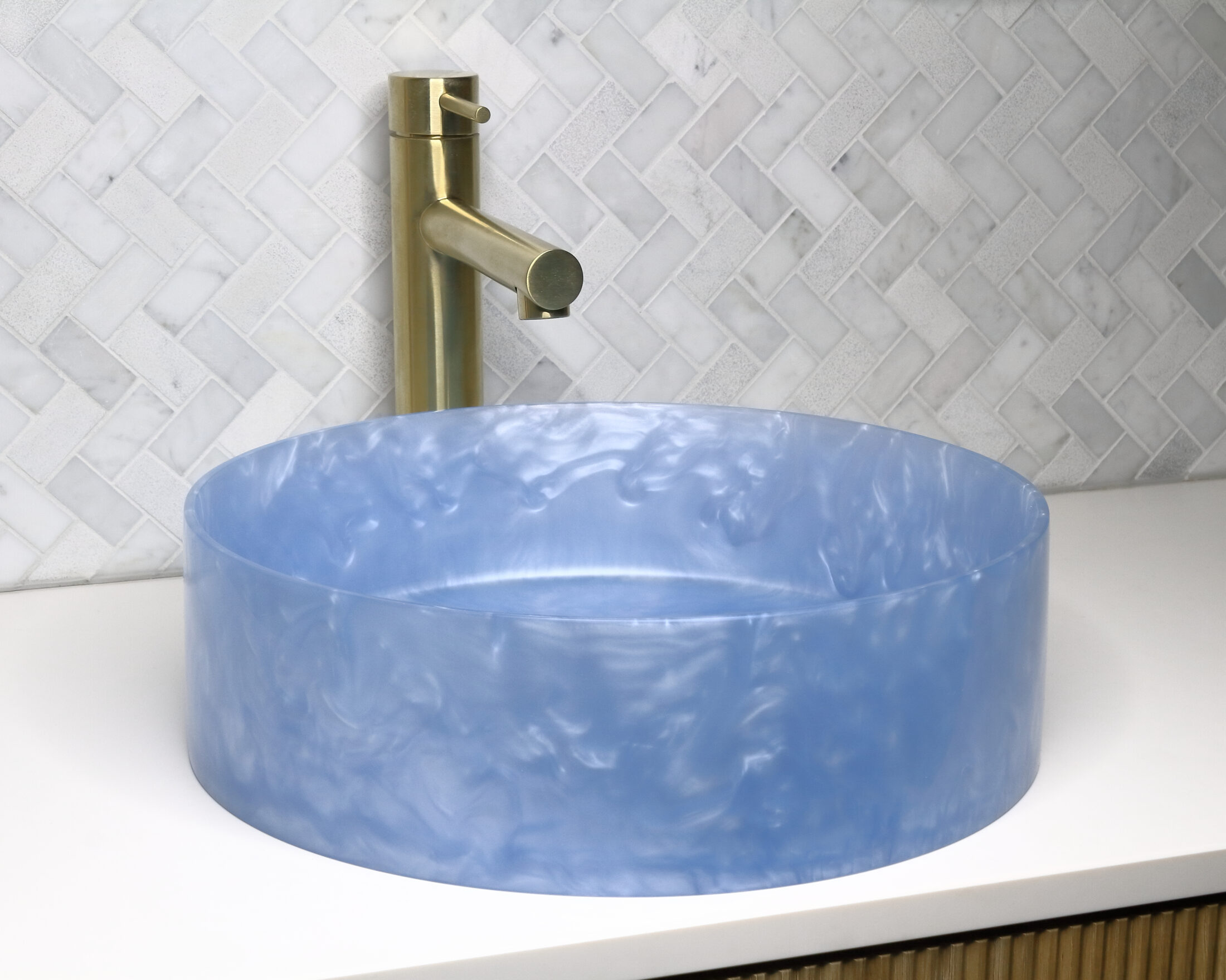 The Basin Lab's tahiti blue coloured resin basin from their akoya series