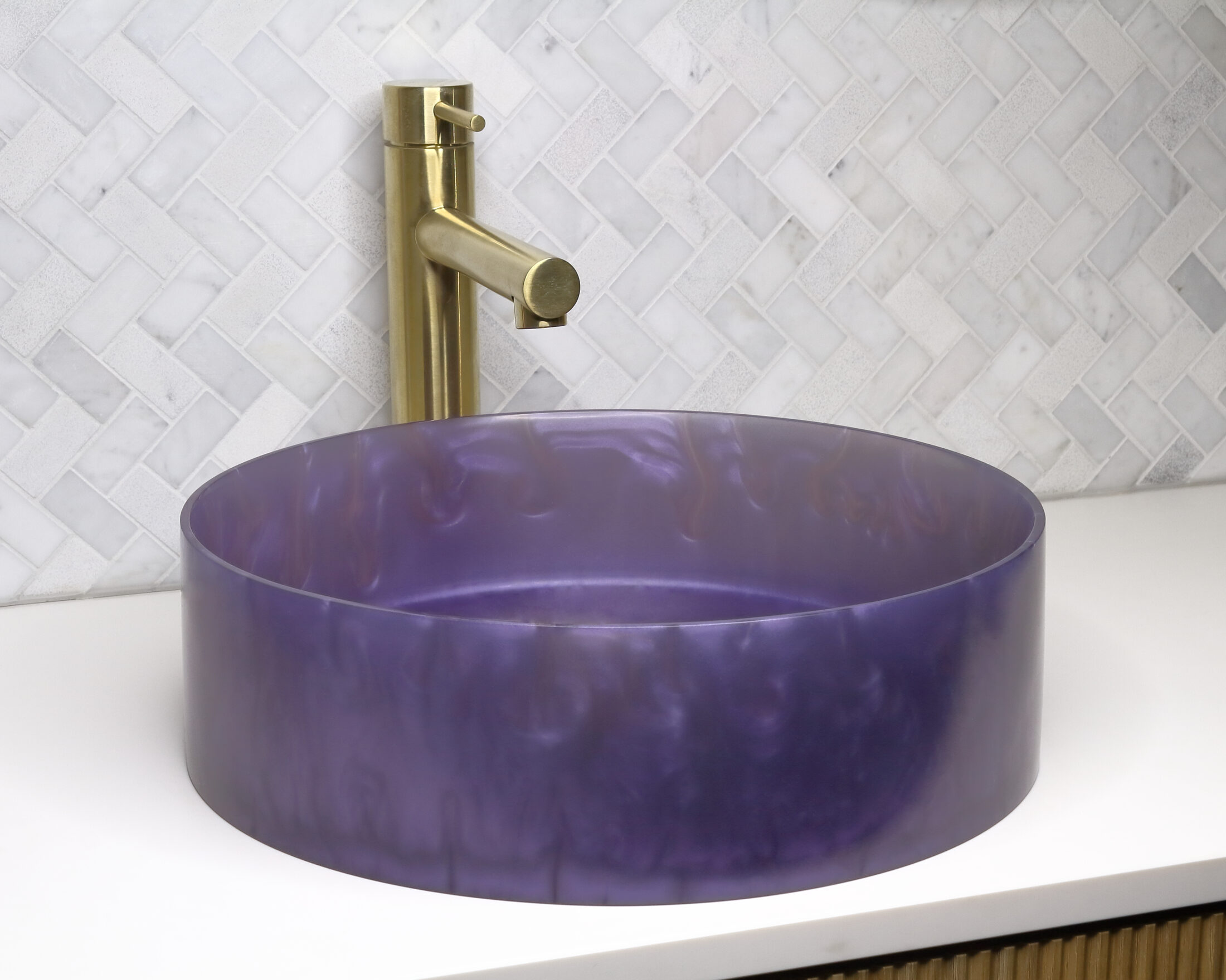 The Basin Lab's amethyst coloured resin basin from their pearl collection