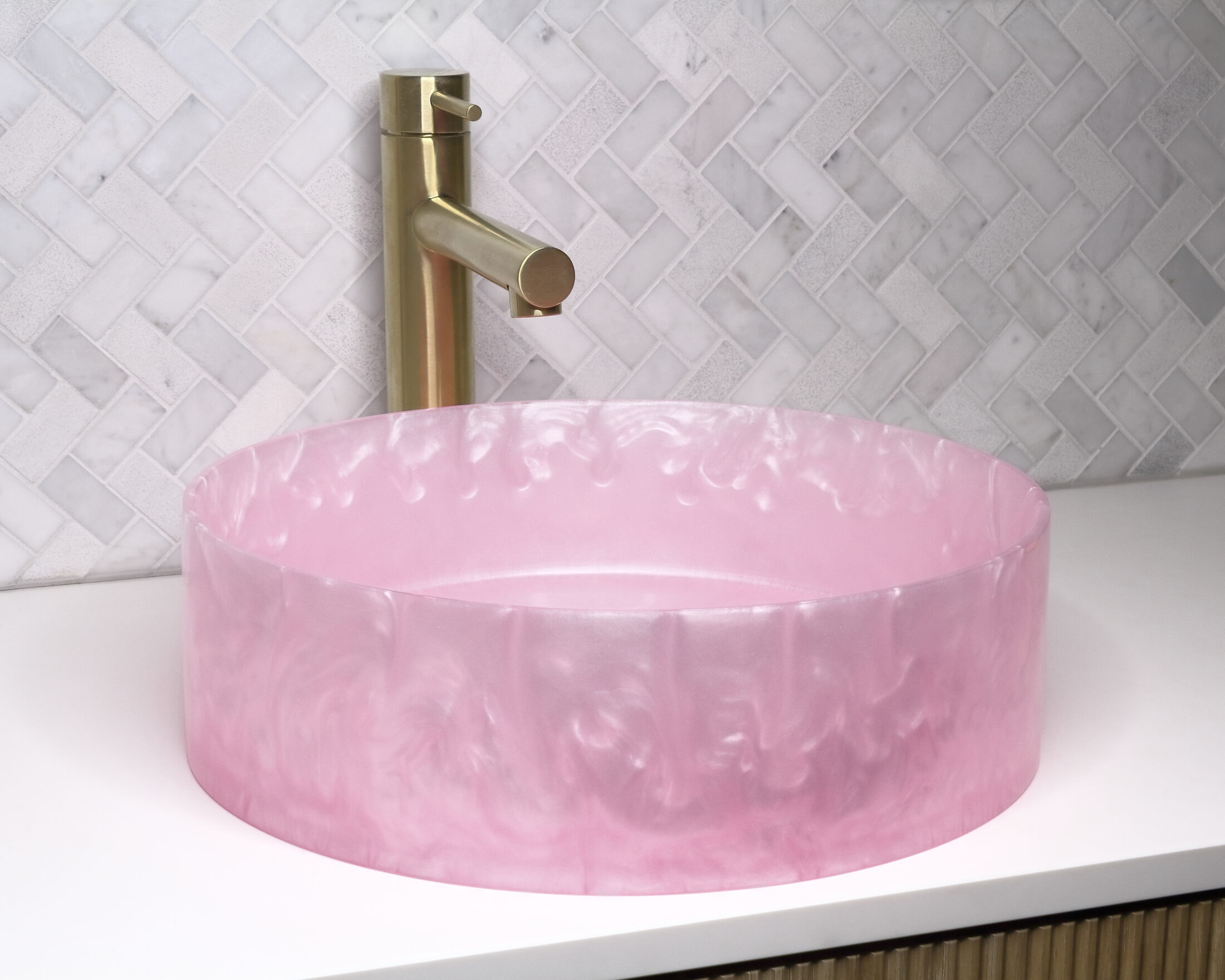 The Basin Lab's barbie coloured resin basin from their pearl collection